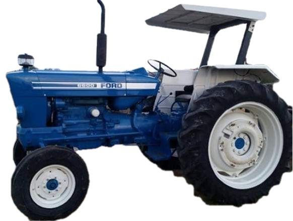 Tractor Ford con implementos agrícolas